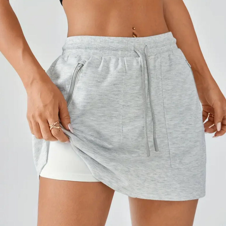Gray sweat skirt with drawstring on a white background