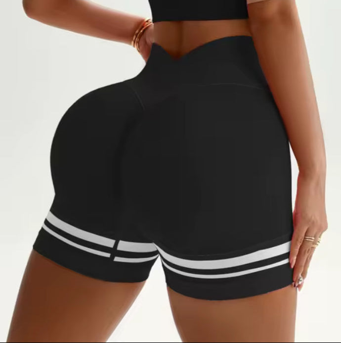 Black athletic outfit with white stripes on a plain background