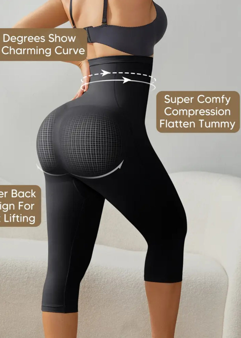 Black compression leggings with text highlighting features on a neutral background