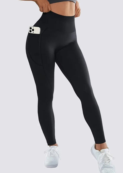 Black leggings with a pocket on a white background